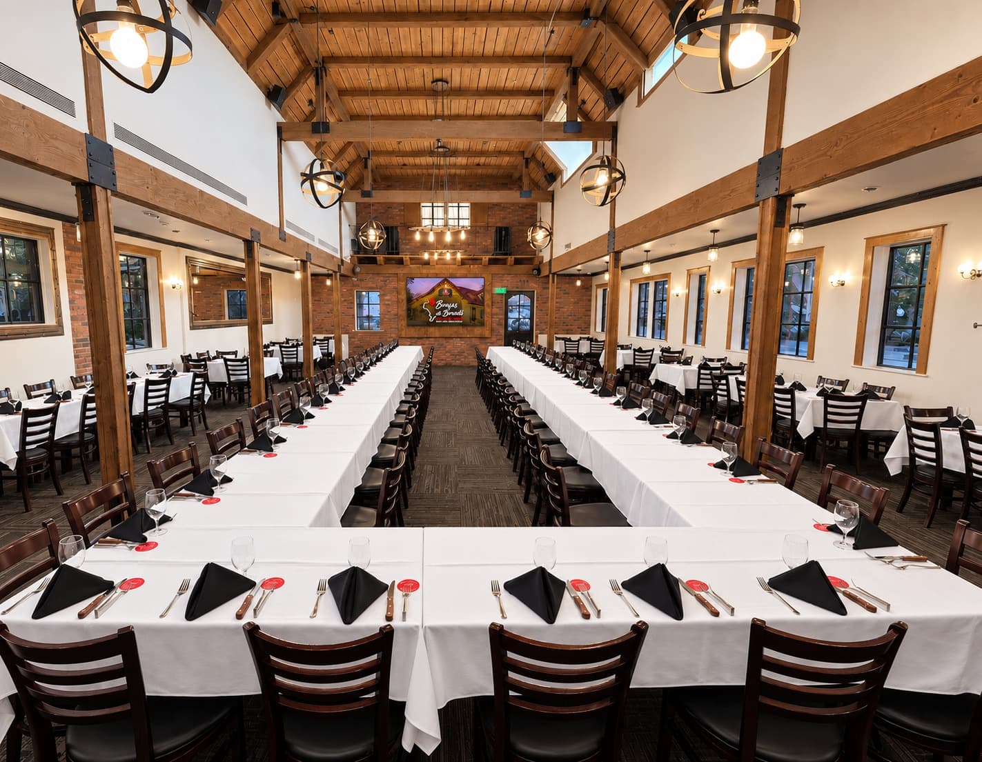 The Garden Room set with long tables for a private event