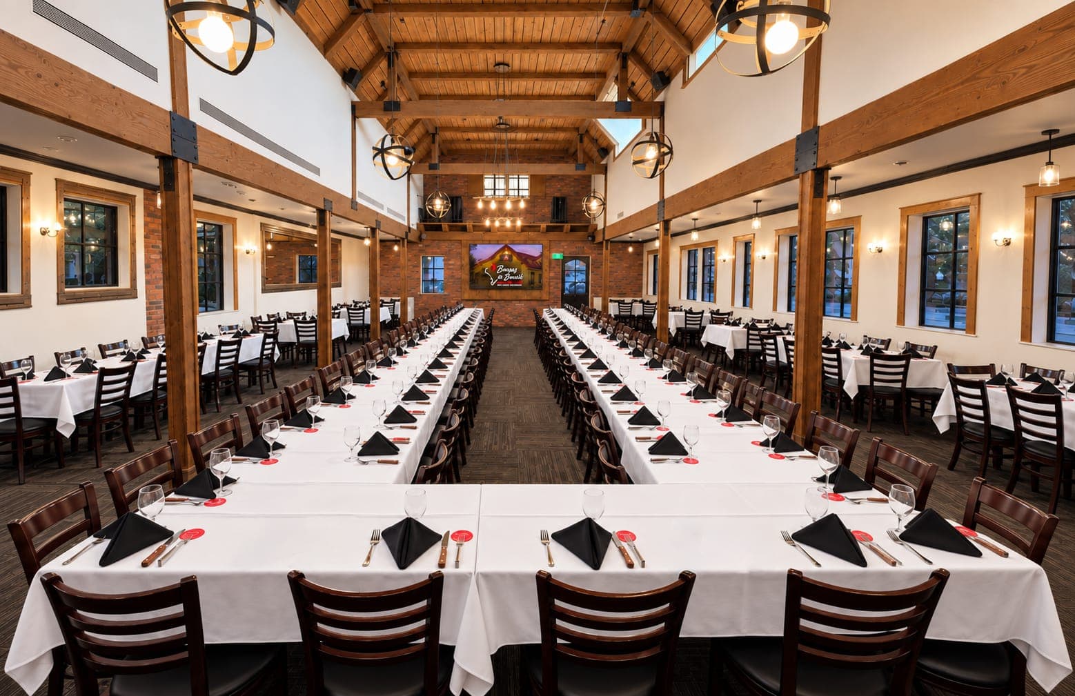 The Garden Room set with long tables for a private event